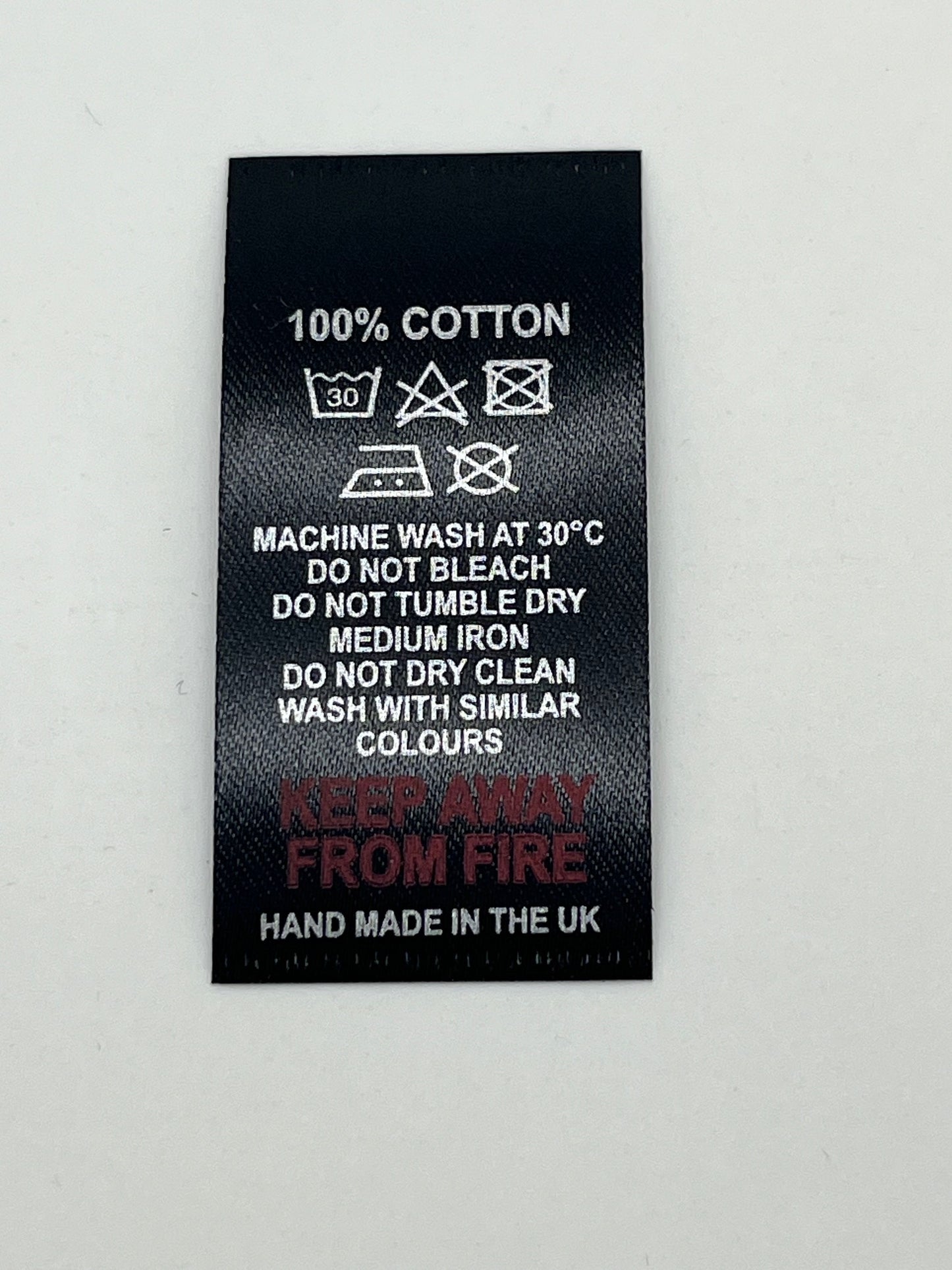 Black Wash care labels with Fibre contents