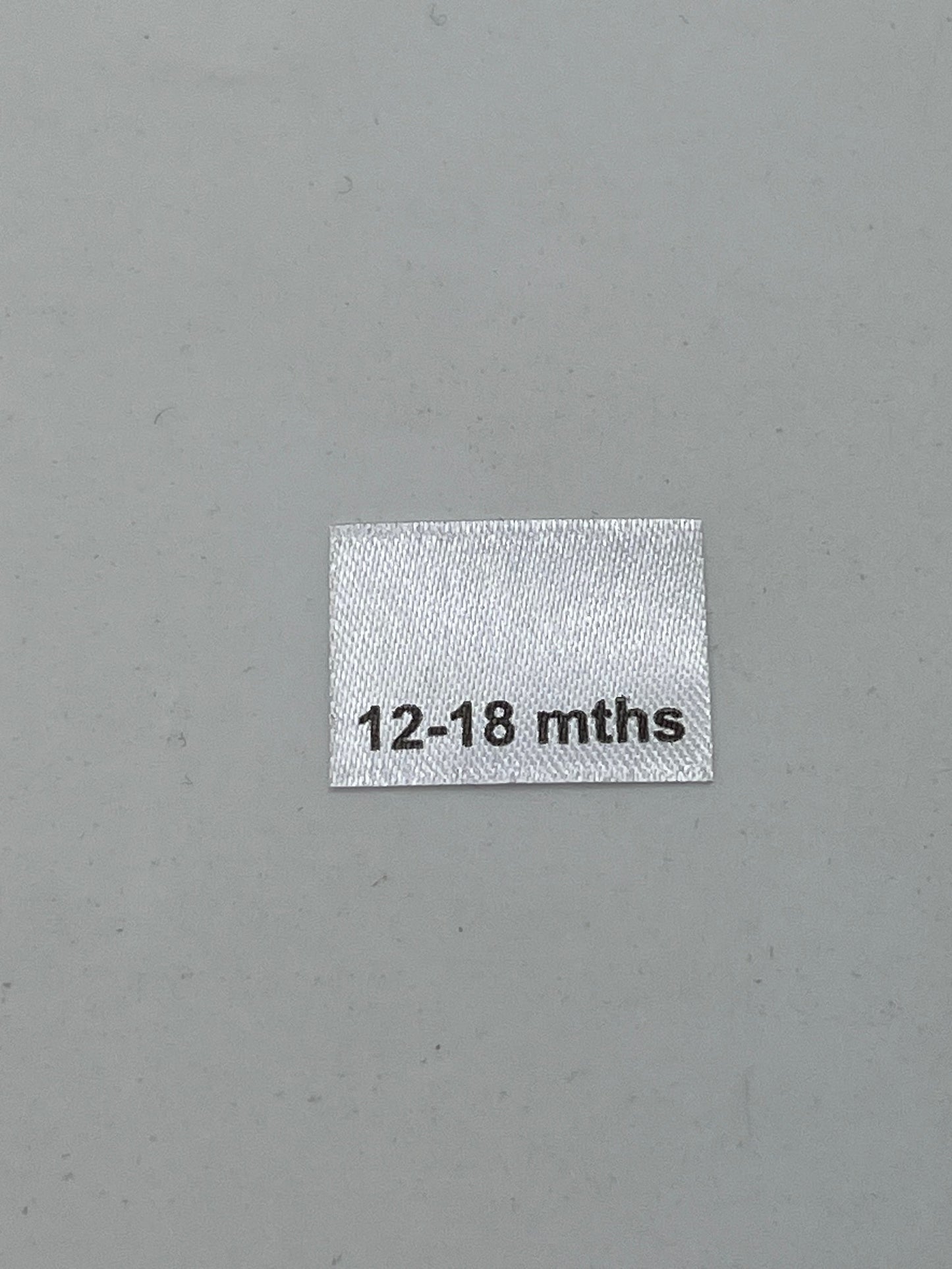 Poly satin Children's Clothing labels / Size tabs / Size labels – White with Black Text