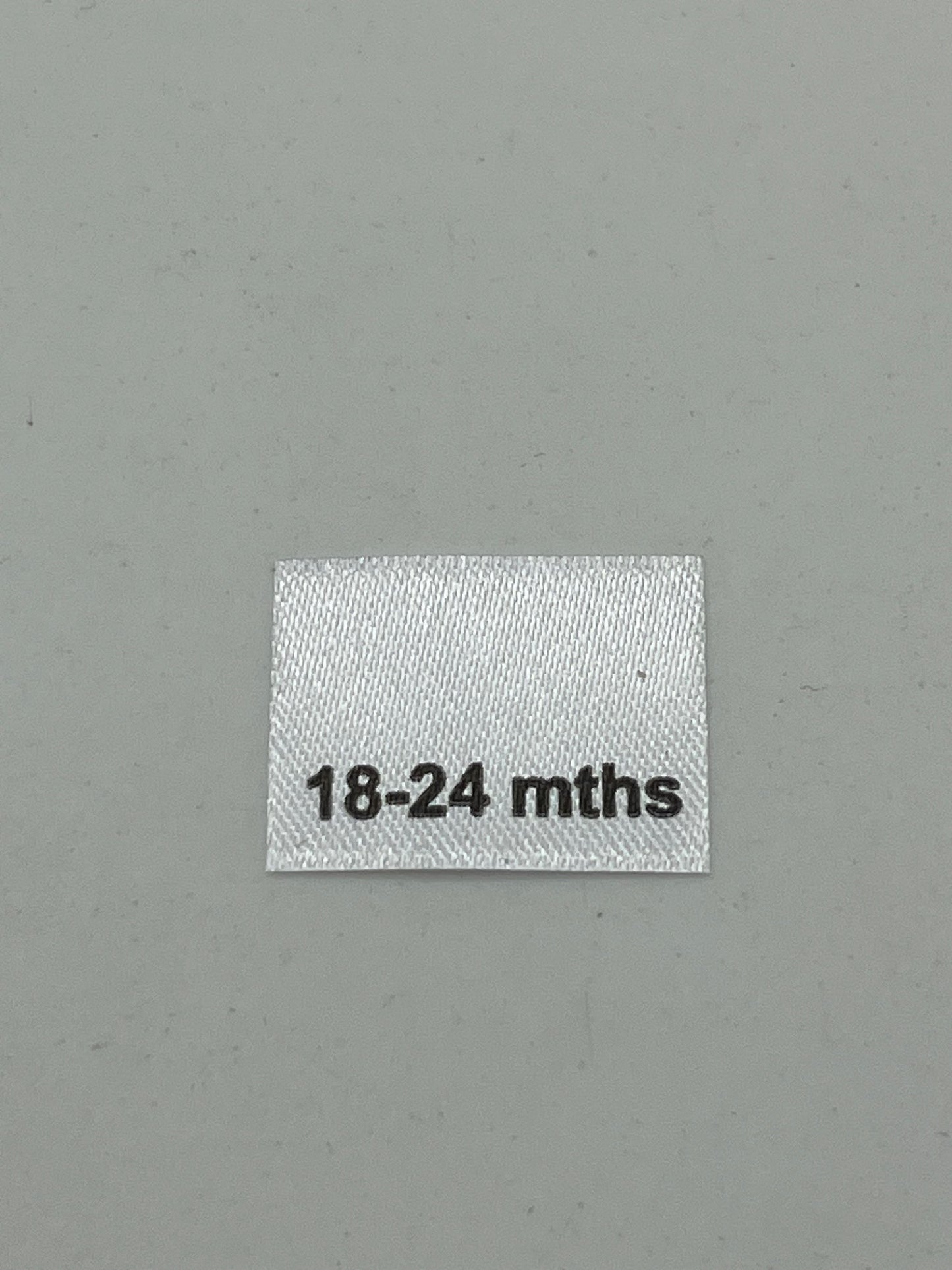 Poly satin Children's Clothing labels / Size tabs / Size labels – White with Black Text