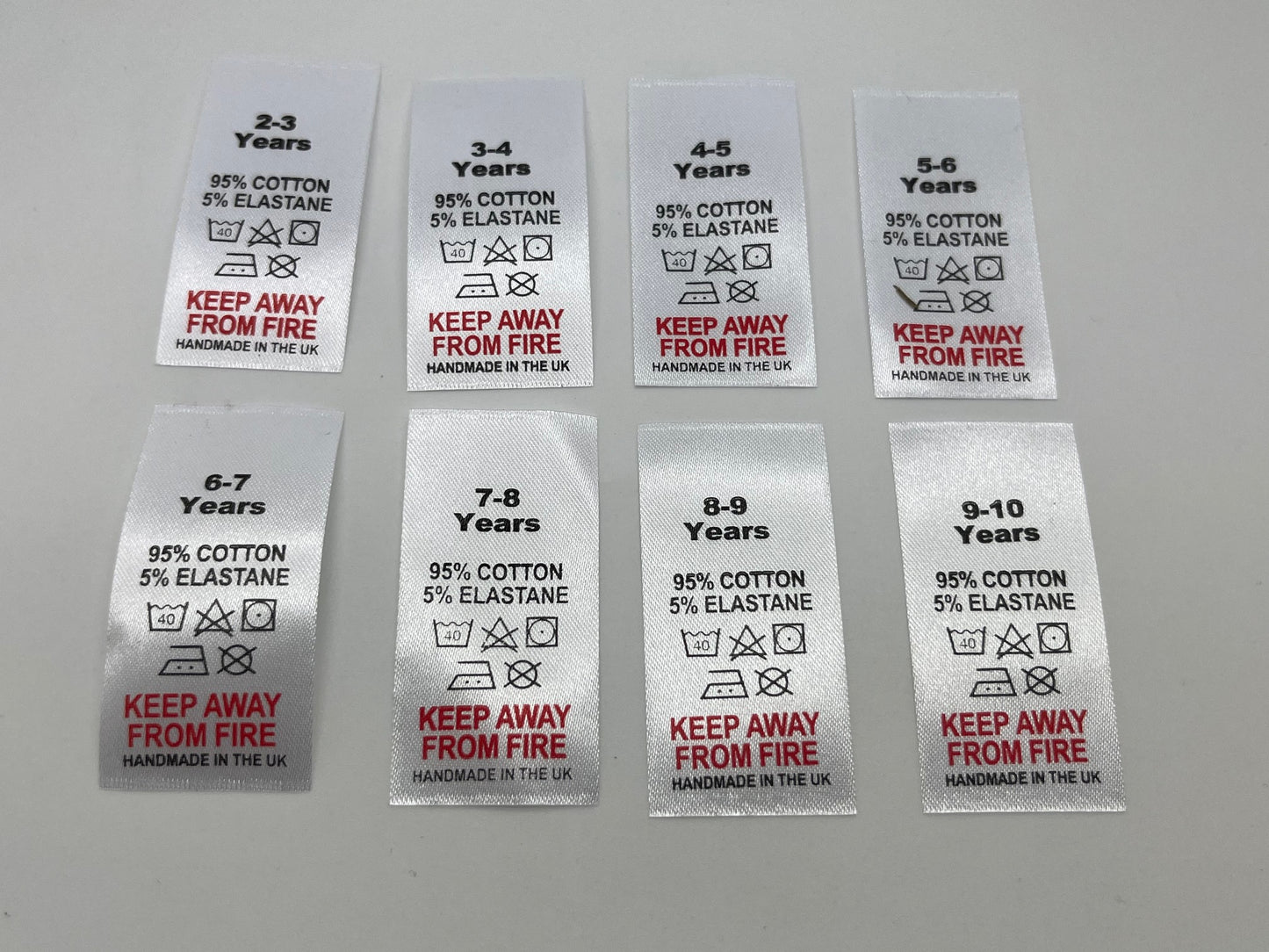 95% Cotton 5% Elastane wash care labels with sizes
