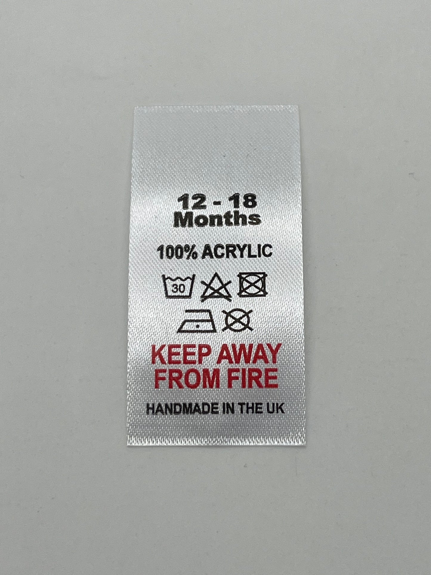 100% Acrylic Wash Care labels with sizes