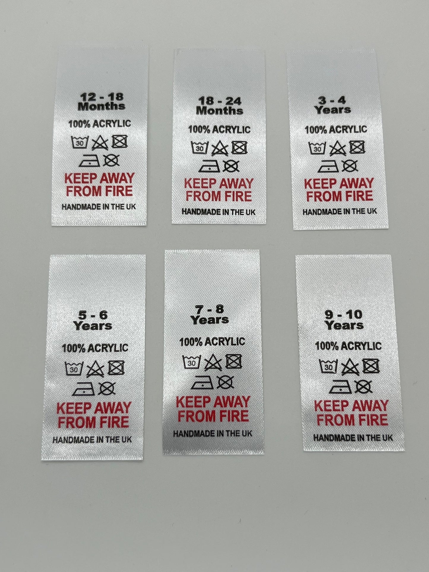 100% Acrylic Wash Care labels with sizes