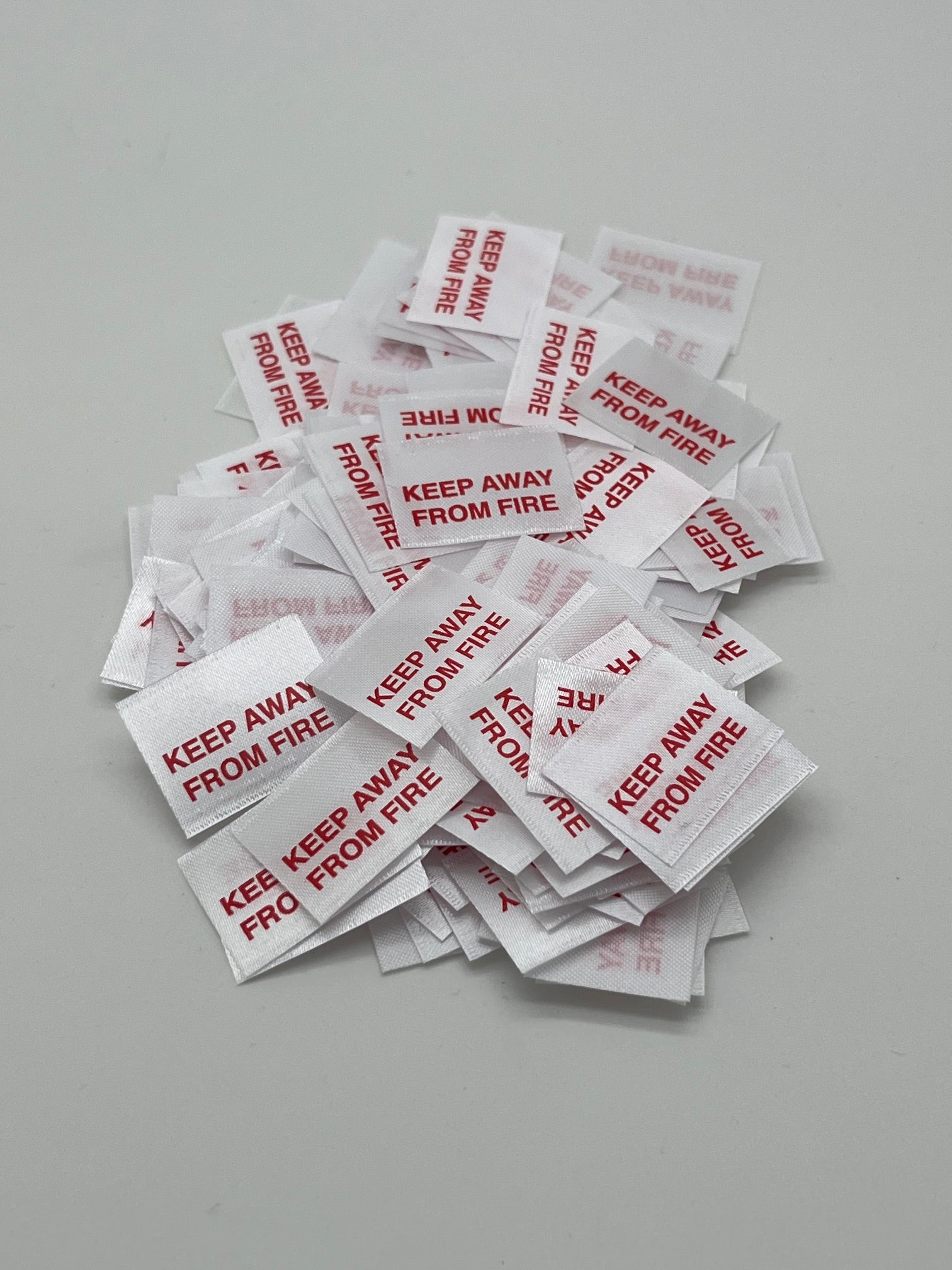 Kaff Red Label KEEP AWAY FROM FIRE - Garment Warning Labels – Trim Warehouse