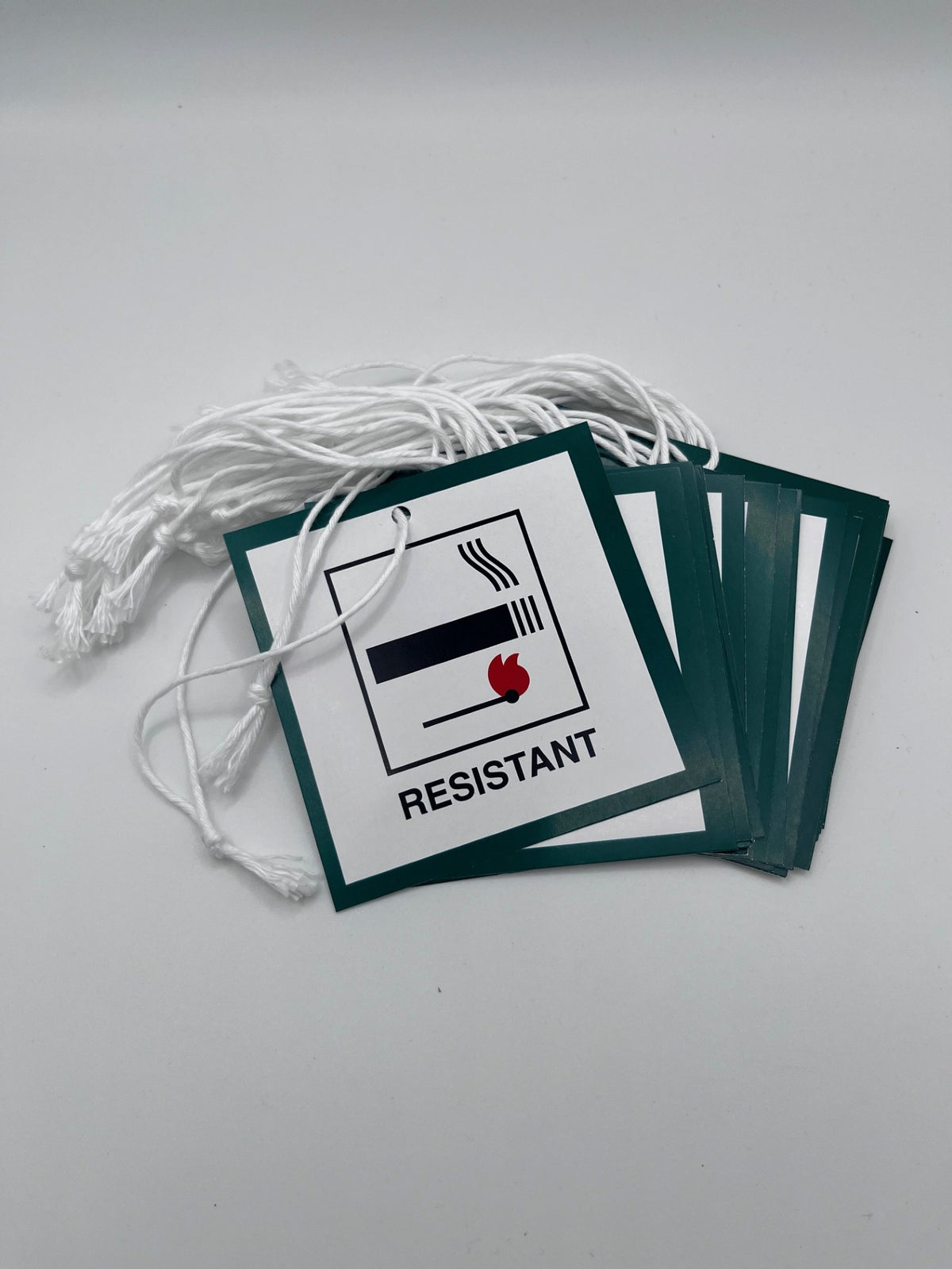DL7 Strung Swing ticket / hanging label (cover match resistant)